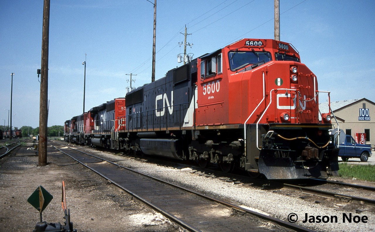 CN SD70I 5600 is viewed waiting between assignments outside the MacMillan Yard diesel shop in Vaughan, Ontario. At the time the unit was less than a year old having entered service on August 9, 1995.