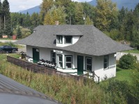 <b> Dunster, BC </b> <br>
VIA 005 The Skeena rolls through CN Dunster, BC on a sunny but hazy September 2, 2026 afternoon. <br>
A nice view of the preserved station is had from the dome of VIA 8718 Yoho Park.
<b> https://www.dunsterstationmuseum.ca/museum_monthlyfeature_dunsterstation.htm </b>