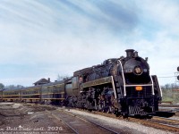 Canadian National Railway "Bullet-Nosed Beatty" 4-8-2 6076 (U1f class, built by MLW in 1944 and scrapped in 1960) swings around the curve at Bayview Junction with a westbound passenger train from Toronto. It's seen coming off the CN Oakville Sub and starting the climb up the Dundas Sub. The old Bayview Junction interlocking tower that was once here is partially visible over the second car. In the foreground was the old steam helper track.<i>Original photographer unknown (duplicate slide), Dan Dell'Unto collection slide.</i>