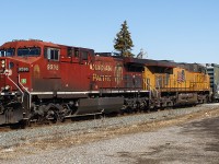 Beautiful, nearly an official Spring day, and thankful I had the camera one trip to the Missions Thrift Store to look around at some furniture. CP 9598 leads UP 5552, with a westbound freight crossing Wellington Street in downtown Chatham.
<br>
<br>
Note the small, and I use this term loosely, "white" logo near the nose of 9598. Thanks to fellow contributor <a href="https://railpictures.ca/author/LukeBellefleur"> Luke Bellefleur, </a> this is the RCMP badge and motto. Of course, one would be hard pressed to see it due to the appearance of 9598. But, still nice to see on a gorgeous sunny day.
