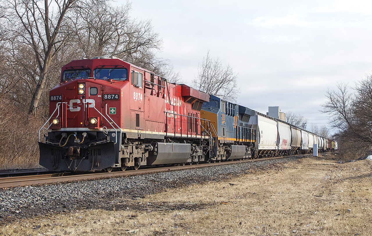 This day proved to be absolutely wonderful for any railfan. Sometimes, here along the old Windsor Subdivision in Chatham, one can witness two trains within half hour of each other at times. 


I'm not sure of what the circumstances were from this day, but here's another great lashup. CP 9974 with a CSX engine trailing, are leading train 141 through Chatham. This was only approximately 15 minutes before  CP 651 came through with a BNSF unit.