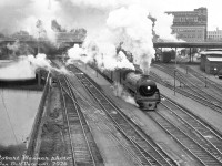 Canadian Pacific Railway "Royal Hudson" H1d 2858 (built by MLW in 1938) departs Ottawa's Union Station with train #504 to Montreal on a cold day in late 1955, seen alongside the Rideau Canal showing the Mackenzie King bridge and downtown Ottawa railway facilities that were once located here. The downtown Ottawa Union Station closed in 1966 when the station and railway facilities were relocated to a new station built outside of the downtown area, eliminating the trackage running along the Rideau Canal. The old station building later became the Government Conference Centre. After retirement, 2858 was one of a handful of Royal Hudsons preserved, going to the Canadian Museum of Science and Technology in Ottawa.<br><br><i>Airman Robert Wanner photo, Dan Dell'Unto collection slide (duplicate).</i><br><br><i>(There's some dispute about the exact date of the photo. Photographer Robert Wanner notes it was taken in late October 1955 (also mentioning this is one of his favourite CPR steam photos), but the description on the mount of this duplicate slide shows November 4th 1955, and yet other photo sources show December 2nd 1955.)</i>