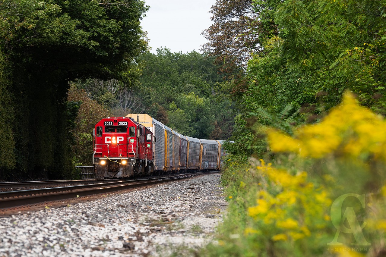 As the extra Honda rounds the bend at Mt Pleasant, one can observe where countless freight trains with their high cube autoracks and double stacked containers have left an indelible impression on the adjacent tree line…