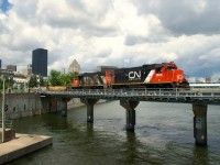 The sun cooperates as CN 500 leaves the Port of Montreal at lunchtime.