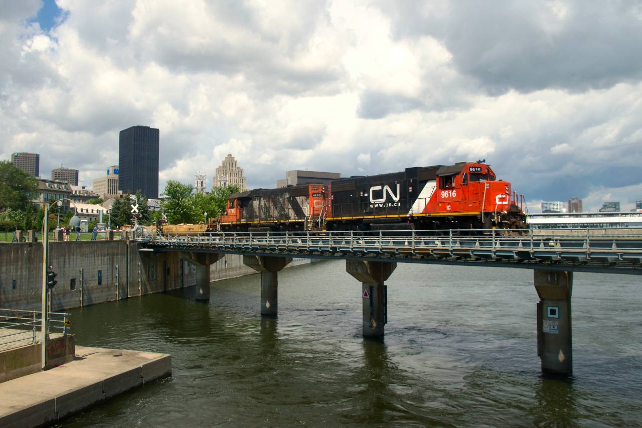 The sun cooperates as CN 500 leaves the Port of Montreal at lunchtime.