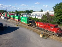 CPKC 119 is building its train at Lachine IMS Yard with the standard for this train CPKC painted leader.