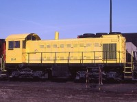 Just passing through!!! General Electric Alco S-1 switcher # 14 is shown at CN's MacMillan Yard in Vaughan, Ontario on March 18, 1979.  The unit is a former Maine Central locomotive that was traded in to GE on MEC's U18s.  The former MEC unit could be either 955 or 956 as both apparently were renumbered to GE 14.