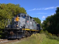 Having departed HOPA's Niagara Port Services Facility at Niagara Falls Road, LDSX 4100 LDSX 1597 with a mix of tanks, hoppers and boxcars head eastward on the Coniages Spur toward the former Hayes-Dana Plant facility.
