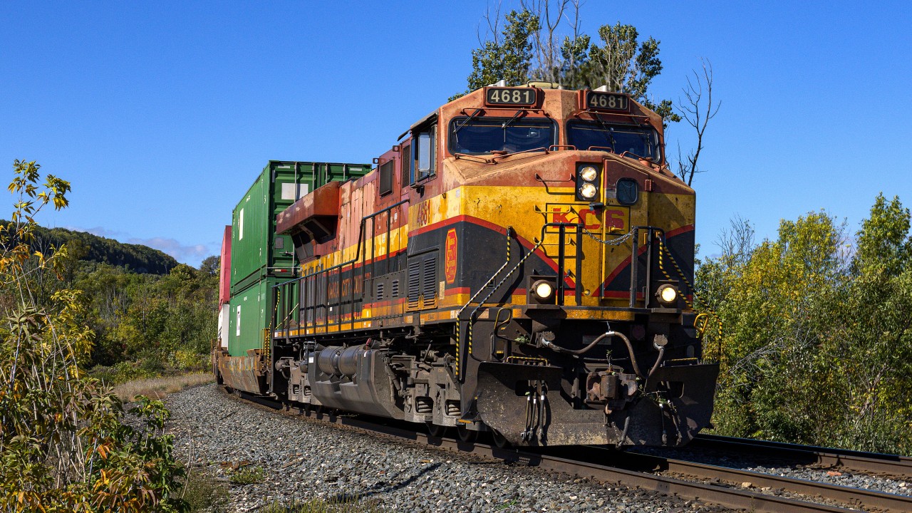 Intermodal operating DP 1-0-1 with KCS 4681 leading and CP 8851 facing out on the rear, descending the Niagara Escarpment about to cross Steeles Ave. W., Milton, Ontario. This train came off the Hamilton Sub. at Guelph Jct. East.