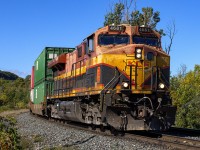 Intermodal operating DP 1-0-1 with KCS 4681 leading and CP 8851 facing out on the rear, descending the Niagara Escarpment about to cross Steeles Ave. W., Milton, Ontario. This train came off the Hamilton Sub. at Guelph Jct. East.

