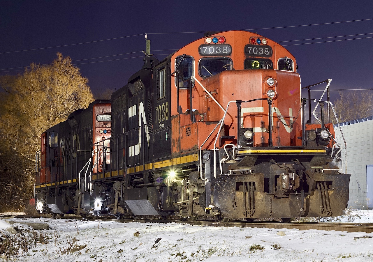“Preston Nights” one of the things I miss most about my old job was sometimes getting to fill in as back up company rep at the Cambridge Toyota plant. Typically a night thing that would allow me to pass by Preston in the early morning hours to see what CN (before that GEXR) had laying over on the old Fergus spur beside the the once busy walk board trans load facility. This arrangement last until the facility moved away off line, forcing this section of track to fall silent for good. The location of a well lit car lot prided lots of useful light for photography. This was the only time I caught a pair of GP9RM’s laying over. Today only a couple customers remain on this one time busy spur, only one customer remains in Cambridge the other close to Guelph.