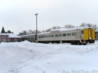 Orangeville-Brampton Railway's former VIA Rail RDC-9 6006 sits on the station track at OBRY's Orangeville Yard, coupled to the other three Credit Valley Explorer passenger cars next to the "new" Orangeville Station on a snowy, cold morning. 
<br><br>
After picking up a friend in Fergus, we headed to Orangeville with hopes of the OBRY running (driftbusting!?) due to recent snowfall activity. Unfortunately, the front of CCGX 1000 was packed with snow, suggesting it had run the previous day. It was pretty much dead there that morning (not unlike Orangeville today, just with more train stuff sitting around), so we settled for some photos of the equipment and station before departing for Guelph.
<br><br>
This rare cabless Budd RDC-9 specimen was one of only 30 built, all for the Boston & Maine RR in 1956. CN scooped up seven in 1965 (6000-6006), that were later passed off to VIA. When VIA retired them in the 1980's, they were stored and most later sold off to dealer David A. Walmsley (this one becoming <a href=http://www.railpictures.ca/?attachment_id=59423><b>DAWX 6006</b></a>). 6006 was sold to Ontario Rail Equipment Leasing (ORXX) in 2006, whose owner was involved with operating the Credit Valley Explorer. It was stored out of use on the OBRY, and photos suggest it may have run as a trailing car on the CVE a few times (with end-mounted lights). It was later sold to the Waterloo Central Railway around when CVE operations ended, coinciding with operation of the OBRY changing from Cando to GIO Rail in 2018.
