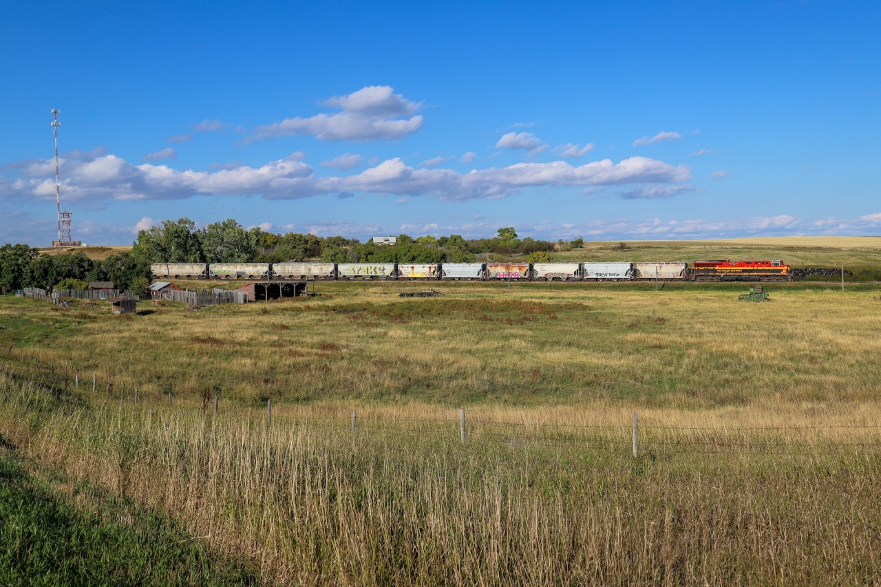 CPKC 444-20 pulls down the siding track at Secretan for a meet with CPKC 315-308