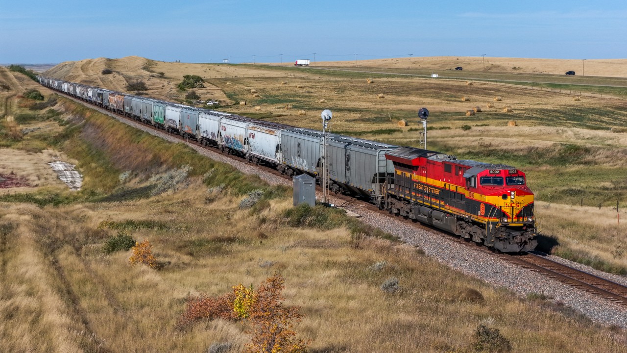 KCS 5002 east splits the signals at Tompkins, SK with CPKC 318-598