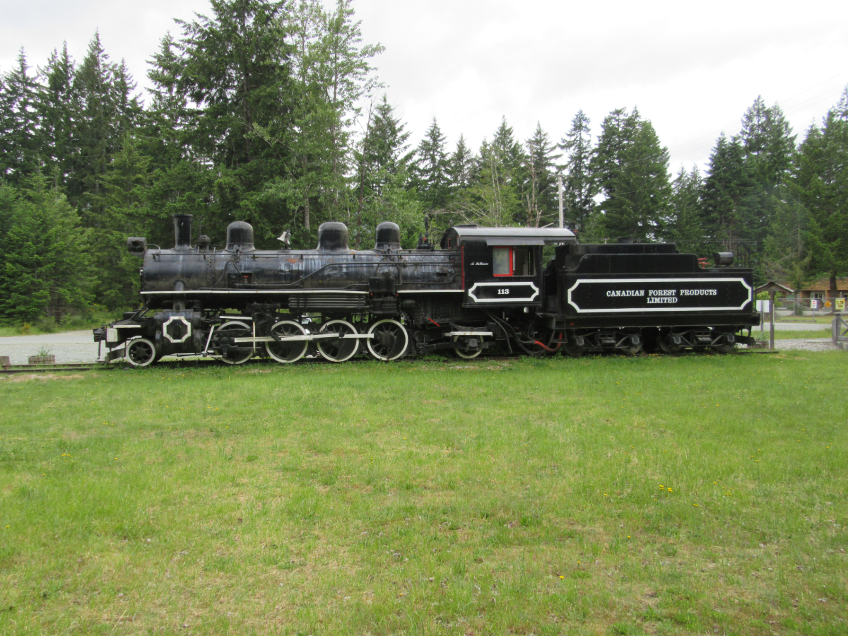 Taken on our Latest VIA Trip to BC! Canadian Forest Products 2-8-2 type steam locomotive #113 on display at Woss, BC. 135 tons, built by Alco in 1920.
This photo is from the latest trip my wife & I took on the 'Canadian' & is part of a 4 part YouTube video series I filmed where: 
-In Part 1 we took VIA Rail's transcontinental train "The Canadian" Westbound from Toronto to Vancouver. 
-In Part 2 we explored Vancouver Island by tour train, rental car & ferry . 
-In Part 3 we journeyed aboard BC Ferries thru the inside passage from Port Hardy to Prince Rupert. 
-And in Part 4 we took VIA Rail's "Skeena" Eastbound thru the Rockies from Prince Rupert to Jasper. 
The video of part 2 - Vancouver Island by tour train, rental car & ferry - is now available on my YouTube channel at: 
 https://www.youtube.com/watch?v=HQG6MN9qKk0 
Cheers! Pete