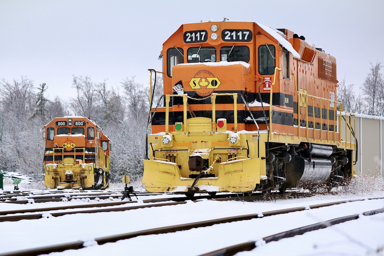 I’ve always had a thing for GP38’s, while maybe not the most exciting units they definitely deserve their praise for what they have done for the railroad industry. I especially like the less common versions like the GP38AC’s and rare PRSL dual control stand versions. In the end the Pennsylvania Reading Seashore Lines ordered 15 of these units with Penn Central ordered a handful. In the end they all went to Conrail and later most of the fleet split between CSX and NS. As they were non Dash-2 they were later sold off. It was a treat years ago crossing paths with this unit when it first arrived in Hamilton in Railtex paint, lettered NECR 3840. It was later repainted into GW paint and lettered RLHH 2117. Its dual control stand replaced and dynamic brakes added. For a period after CN took back Hamilton operations this unit was relocated to GEXR’s Guelph Junction Railway operations, before being sent out to Stratford. This day the fresh snow made the shot as power awaited the next call to duty at Guelph Junction.