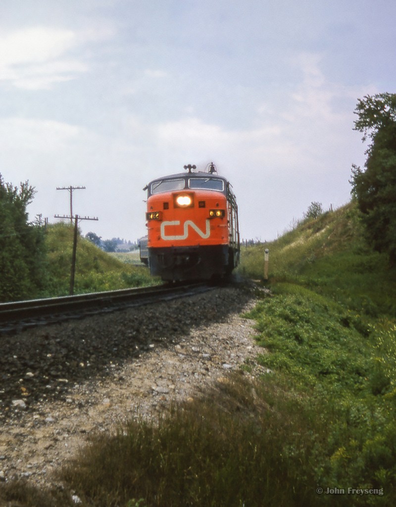 Running Toronto - North Bay via Beaverton, train 43 snakes through the curves of the Bala Sub just south of Mount Albert.

Scan and editing by Jacob Patterson.