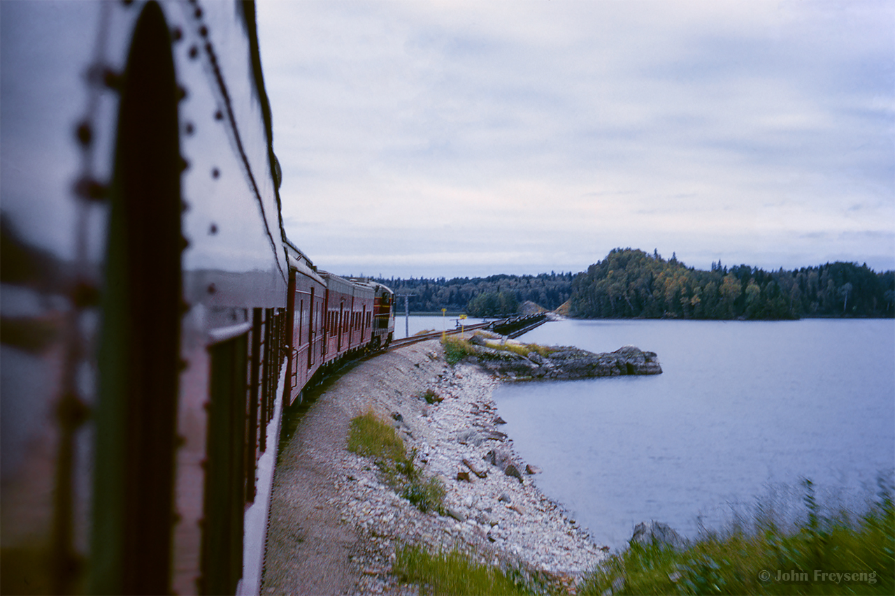 Shortly after departing Oba, ACR train 2 approaches the trestle over Lake Oba at roughly mile 212.5, a few miles south of Mosher.

Pausing at Oba
The head end
ACR meets CN
New GP35s

Scan and editing by Jacob Patterson.