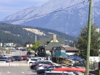 <b> Idle steam and diesel power </b> <br>
Arriving in Jasper, AB VIA 002 The Canadian rounds the curve at Mile 0.00 on CN's Albreda Sub. onto the station track on a beautiful September 1, 2026 morning. <br>
Sitting static for all on board to see are VIA 6424, and CN 6015. One unit waiting for its next assignment in the next few days, the other having completed its final assignment many decades ago. <br>
