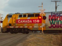 Although I lost more sunlight than anticipated, plus trying a pan shot, I was pleasantly surprised to have gotten this photo. VIA 914 in it's Canada 150 wrap, leads train 78 from Windsor (third from top on the engine!) across Dillon Road on its way to the next station stop at Chatham.