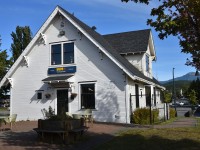 <b> VIA station Terrace, BC </b> <br>

This is the VIA station in Terrace, BC at Mile 131.9 CN Bulkley Sub. and Mile 0.0 CN Skeena Sub. on September 4, 2026. <br>

The original station at Terrace was erected in 1911, to the standard-design Plan 100‐152 (Bohi's Type E) station building. <br>

The building pictured was built around 1914 and designated a national historic site in 1982. The George Little House was moved to its present location in 2004. The next year, the renovated main floor became tourism facilities and the Via Rail waiting room, replacing the small stationette.