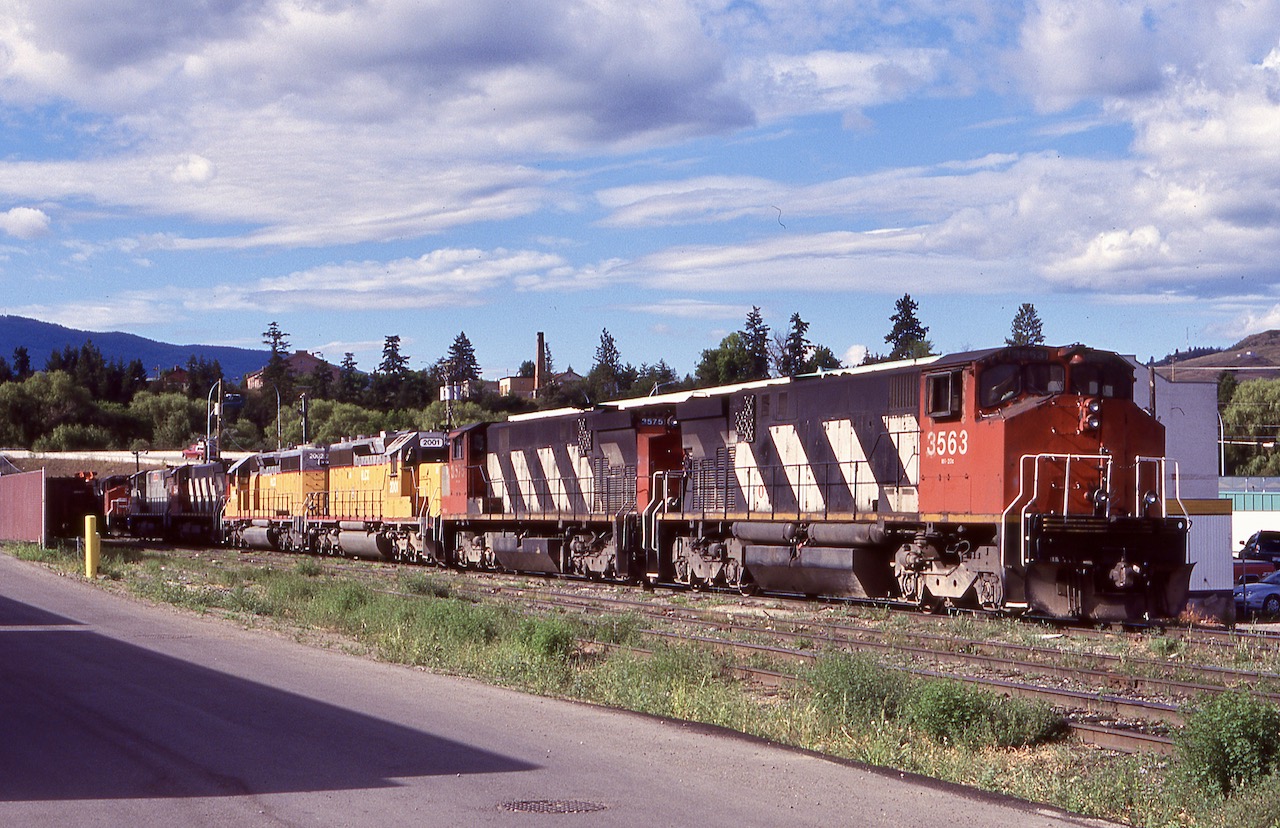Back in 2003 the area still had two shortlines operating in the area over both former CP and CN lines. Not the case today unfortunately with only CN serving what rails remain. On this trip we hoped to get both railways operating but unfortunately the two days we had in the area nothing ran. I wasn’t exactly sure where the power at the time was kept but after scoping out the area we came across almost all of their power. For a brief period Trillium Railway had some kind of connection with the KPR I believe as their former M420 3575 is in the mix. The two HLCX former UP SD40’s (rebuilt into SD38’s) were a sign of what would become of the motive power here as the MLW’s would eventually be sold to Lake State Railway in Michigan and replaced with GP38’s. Eventually the KPR folded and CN returned to operate what remains here today.moving or not I certainly can’t complain with the consist this day in front of my eyes.