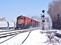 <br>
<br>
A pair of MLW's finest, with a GMD trailing....
<br>
<br>
And on the South Track that's a high green for an eastbound, at one of my top ten places, Leaside, March 2, 1980 Kodachrome,  by S.Danko
<br>
<br>
more, a quick – multiple cameras switch up
<br>
<br>
     <a href="http://www.railpictures.ca/?attachment_id=  58482 "> wide angle capture   </a>
<br>
<br>
sdfourty