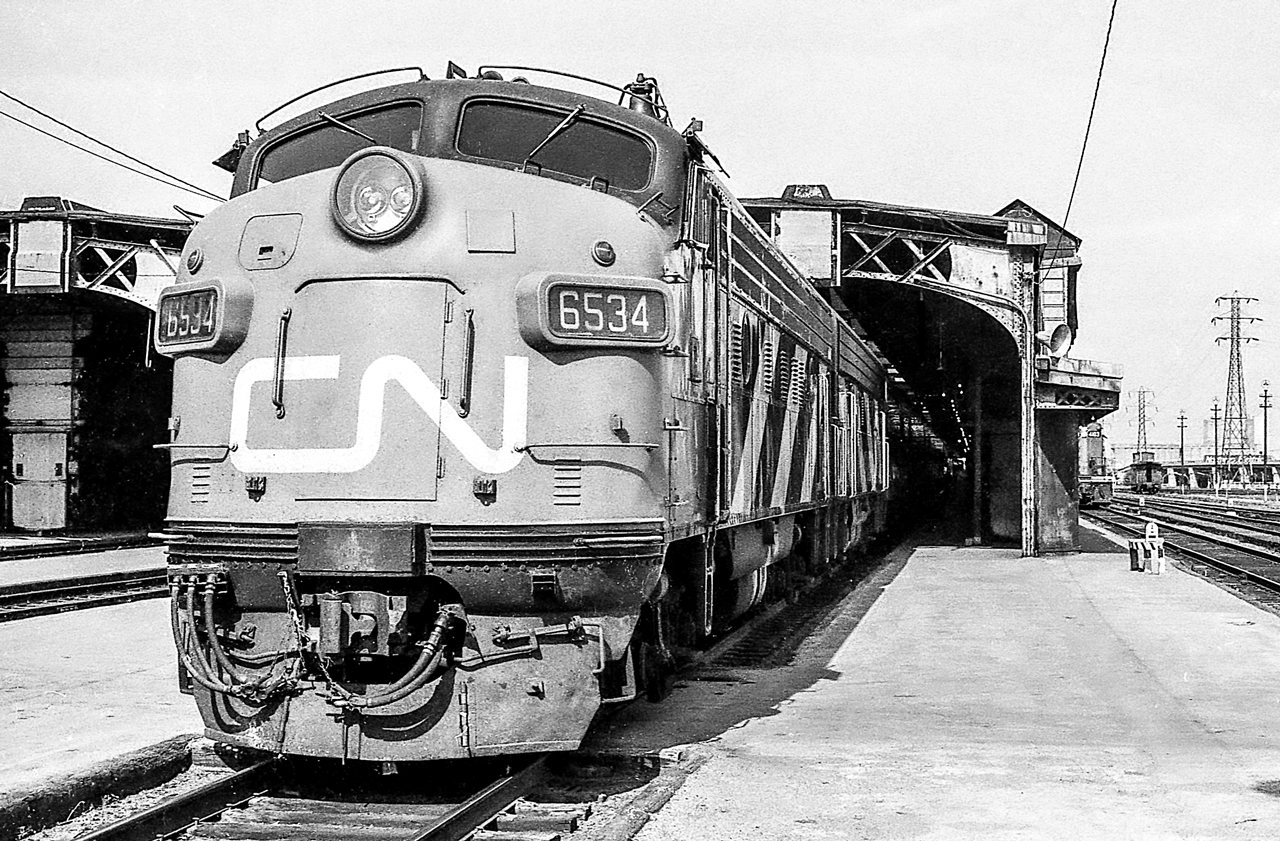 CN 6534 is at Toronto Union Station in Toronto in June 1972.