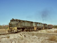 At the south switch of Nig, a southward freight from Fort Nelson to Fort St. John and Chetwynd on Tuesday 1978-09-26 was powered by a delightfully mixed consist of BCOL 642 (M-420) + 606 (RS-18) + 567 (RS-3) which passed at 1125 PDT.