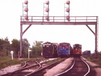 No room at the Inn.   The CN came in a while before I arrived at CN Duff (as you can see, Mile 3 Stamford Sub) and the Conrail caboose is on the end of a train rolling in, while the N&W 2707 is about to lead a train westbound.
Far cry from today's activity; which, most of the time, is closer to nil.