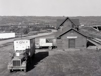 With a CN truck foretelling an ownership change just over three months ahead, operations at the Northern Alberta Railways depot at Peace River continued, with NAR 209 bringing the homeward-bound Hines Creek wayfreight into town on Saturday 1980-09-27.

<p>That depot is a survivor, built in 1916 and a Visitor Information Centre today.
