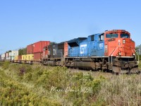 Train 148 rolled into Sarnia, ON., with the GT heritage unit leading and tied down for about an hour before continuing east on the Strathroy Sub on a beautiful early fall morning. 