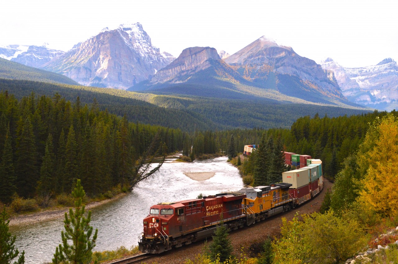 It is almost an unwritten rule that lovers of railroad photography have to visit Morant's Curve at least once. I cannot recall if I posted this photo from there.  If I already have.....oops!!!
This image on an early fall day in 2021 catches CP 8822 and UP 7000 with an eastbound running along the Bow River.  The Curve is about 3 miles out of Lake Louise, Alberta, roughly north east. It is a must for the fans. I had to wait about an hour, but it was well worth it.  Mind-blowing scenery.