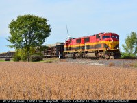 CPKC ran an eastbound welded rail train out of Chicago bound for Montreal October 10, 2026.  Power was a pair of SD70MACs, KCS 3940 & 3961, and as luck would have it they were slow getting to Windsor.  With a mammoth #529 train (196 cars), also on the line, the two trains met in Belle River which gave me some extra time to setup for a shot of the KCS 3940 East.  Here the CWR train rolls along the CPKC Windsor Sub between St. Joachim and Haycroft after having already met CPKC #529 in Belle River.