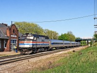 Amtrak F40PH #268 brings VIA train #98, the Maple Leaf, to a stop in St. Catharines nearing the final miles of its journey from NYC (well, Albany for the locomotive) and its own final miles with Amtrak. P42s were soon to take over. The Maple Leaf was one of the last holdouts for the Amtrak F40s, as VIA crews were not yet accustomed to P32/42 locomotives. Once VIA retired their LRCs and crews became familiar with the P42, Amtrak began deploying their own on this and the Adirondack train. The venerable Amtrak F40s were relegated to the dust bin of history.