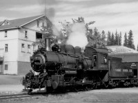 Canmore Mines Limited 0-6-0 #4 is seen moving coal hoppers around the facility just across the Bow River from the mines' namesake town.  Built by CPR's Angus Shops in 1905, the locomotive would be sold to Canmore Mines in 1934, until retirement between 1961 and 1963.  The locomotive would then be donated to Calgary's Heritage Park, with it is on display as <a href=http://www.tramsandtrains.de/fotos/kanada/museum/heritage_park/p1410702.jpg>CPR 2018.</a>

<br><br><i>James H. Bickerton Photo, Jacob Patterson Collection.</i>

<br><br><i>[Geotagged location not exact].</i>