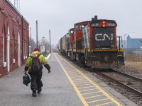 <b>ALL DONE - in more ways than one.</b>
<br>
<br>
First, it's the end of the shift, for the crew. After running to Thamesville and Blenheim, both GMD1 1412 (pictured), along with 1444 (hidden) are shoving their small cut of cars to park at the end of Merritt Ave. They will be picked up by CN 438 in the evening.
<br>
<br>
Second,  it would be the following year that these old units would be retired. I would be lucky enough to see 1412 one more time, that summer <a href="http://www.railpictures.ca/?attachment_id=42144"> again as power for 514. </a>
Thankfully, one unit (ex-CN 1437) was donated to the Waterloo Central Railway. With a fresh coat of paint in traditional green and gold paint scheme from the 50s, it's <a href="http://www.railpictures.ca/?attachment_id=48154"> renumbered as 1012 (Stephen C. Host photo). </a>