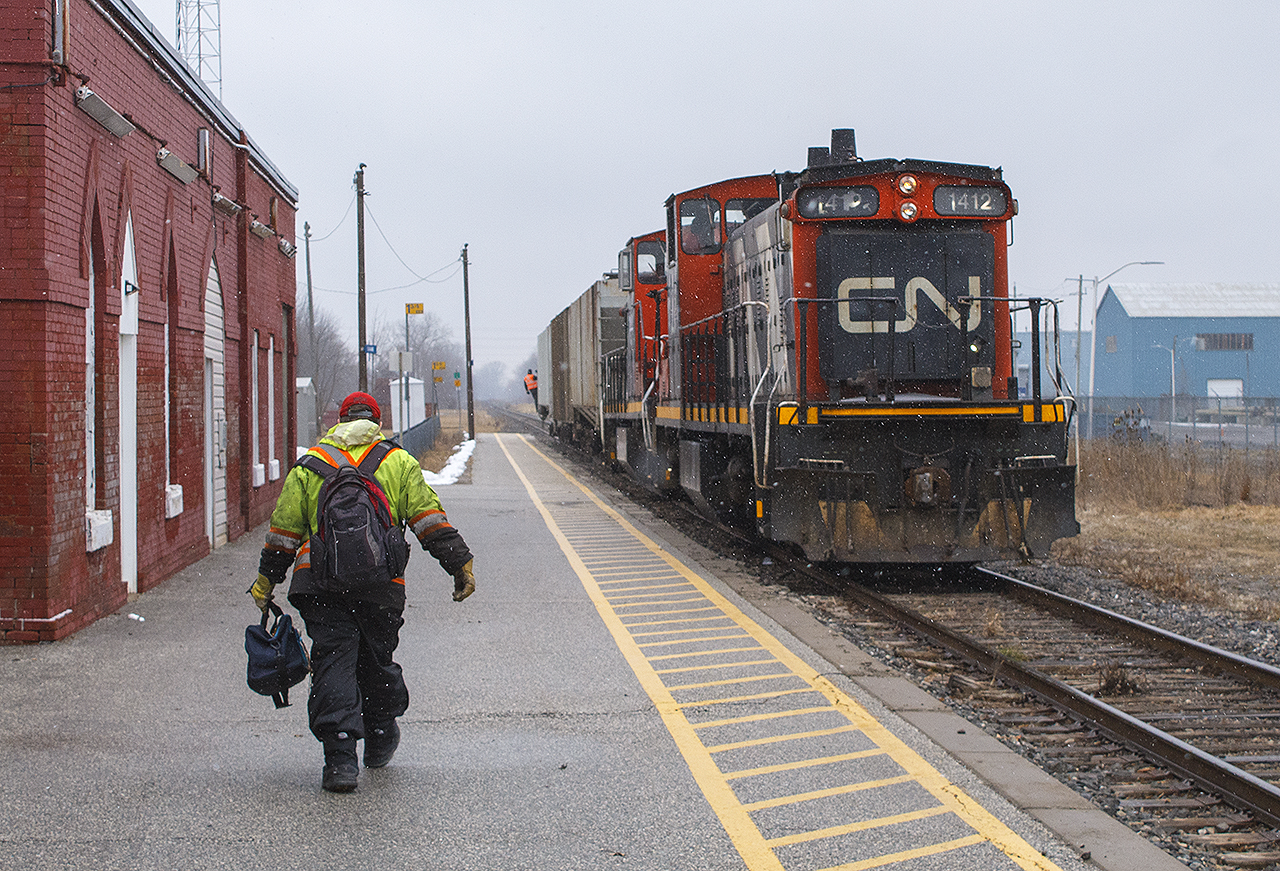 ALL DONE - in more ways than one.


First, it's the end of the shift, for the crew. After running to Thamesville and Blenheim, both GMD1 1412 (pictured), along with 1444 (hidden) are shoving their small cut of cars to park at the end of Merritt Ave. They will be picked up by CN 438 in the evening.


Second,  it would be the following year that these old units would be retired. I would be lucky enough to see 1412 one more time, that summer  again as power for 514. 
Thankfully, one unit (ex-CN 1437) was donated to the Waterloo Central Railway. With a fresh coat of paint in traditional green and gold paint scheme from the 50s, it's  renumbered as 1012 (Stephen C. Host photo).