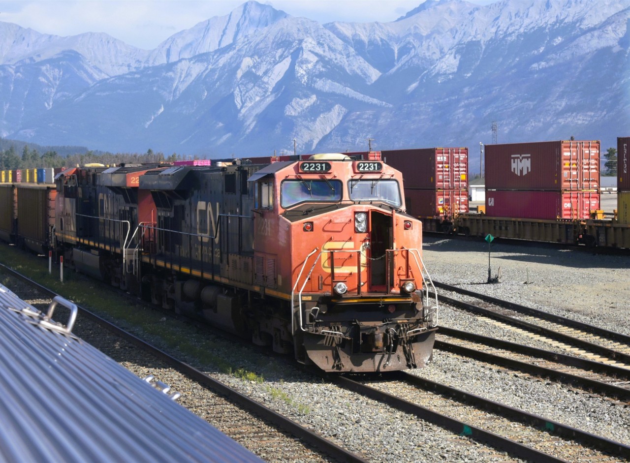 Waiting for the new crew  
CN 2231 and CN 2292 are ready to continue west out of Jasper Yard as soon as the new crew boards. 
There was non-stop train movement during my 4 days in Jasper this past first week of September. 
Not a bad place to hang out the last long weekend of summer. :-)