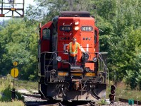 CN 4116 is seen switching in the yard, long nose forward. And, conductor standing perfectly poised on the platform. To the right, one can just see into view the <a href="http://www.railpictures.ca/?attachment_id=21015"> plaid shirt sleeve of the engineer. </a> I was told he always looked like that, but still gave me a wave when they finished their shift.
