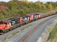 CN 6020, CN 6013, and CN 5250 working hard to shove another cut of cars across the hump at Mac Yard