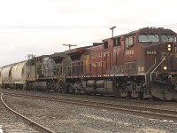 <b>A SIGN OF THINGS TO COME?</b> CP sure had some grungy units leading their trains. I likely would've passed but there was a 'grey ghost' included in KCS 4531. Nice, after work catch even though it's as grungy as CP 8649. All of this, before the merger of these two roads. 