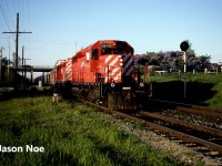 During a spring evening, CP auto train 737 with SD40-2’s 5649 and 5682 is pictured entering the siding at Puslinch, Ontario on the Galt Subdivision for a meet with an eastbound. Having already photographed the train near the ski hill in Halton Hills, this was the second time the friendly crew had seen my friends and I. As the train was coming into the siding it slowed to a stop and the engineer yelled down to us, “Hey do any of you want to come for a ride to Orrs Lake?” About thirty seconds later after a quick discussion with my friends, I climbed into the cab of 5649 and the auto train slowly began moving into the siding at Puslinch. 