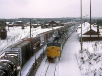The westbound Canadian at the station by the Canadian Pacific yard in Chapleau.
