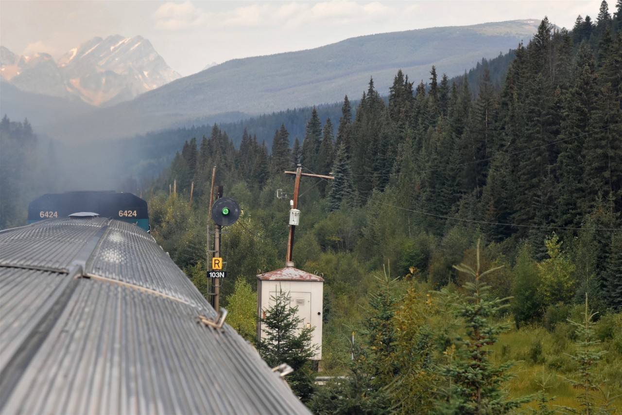 Clear signal notch-up  
The headend crew calls a 'Clear Signal' at Mile 10.3 on CN's Albreda Sub. followed by a couple of notches on the throttle as VIA 005 The Skeena makes it way west, 10 miles into the two-day journey from Jasper, AB to Prince Rupert, BC. 
The searchlight signal at Mile 10.3 is well aimed and provides a crisp clear indication for the two engineers. 
Upgrades along the CN subdivisions from Jasper to Prince Rupert are gradually replacing the decades old searchlight masts and heads with new state-of-the-art LED fixtures.