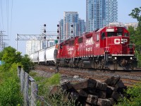 GP38-2 CP 3087 leads with GP20C-ECO CP 2322 trailing on a CPKC Galt Sub local past the Westward signal bridge at Obico towards the Bloor controlled location where they backed into the spur in the foreground to service the industries South of here.