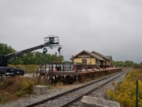 For the fourth time in six years, GIO Rail trackage is used as a film location. The previous being Handmaids Tale in 2020 and 2023, and a Mr Beast challenge in 2024. This time, the former Cayuga Subdivision trackage in Dain City is being used for the Amazon series Reacher. Here we see a station erected for filming a scene at the fictional "Mothers Rest" station. VIA lent a F40 and a few coaches for the train used in said scene. The train was left under scaffolding where GIO generally keeps their power at Feeder, making it difficult to get a photo. After filming, the station was destroyed. One of the GIO guys I talked to suggested using it for an office, but the higher ups must've not shared the same idea. 