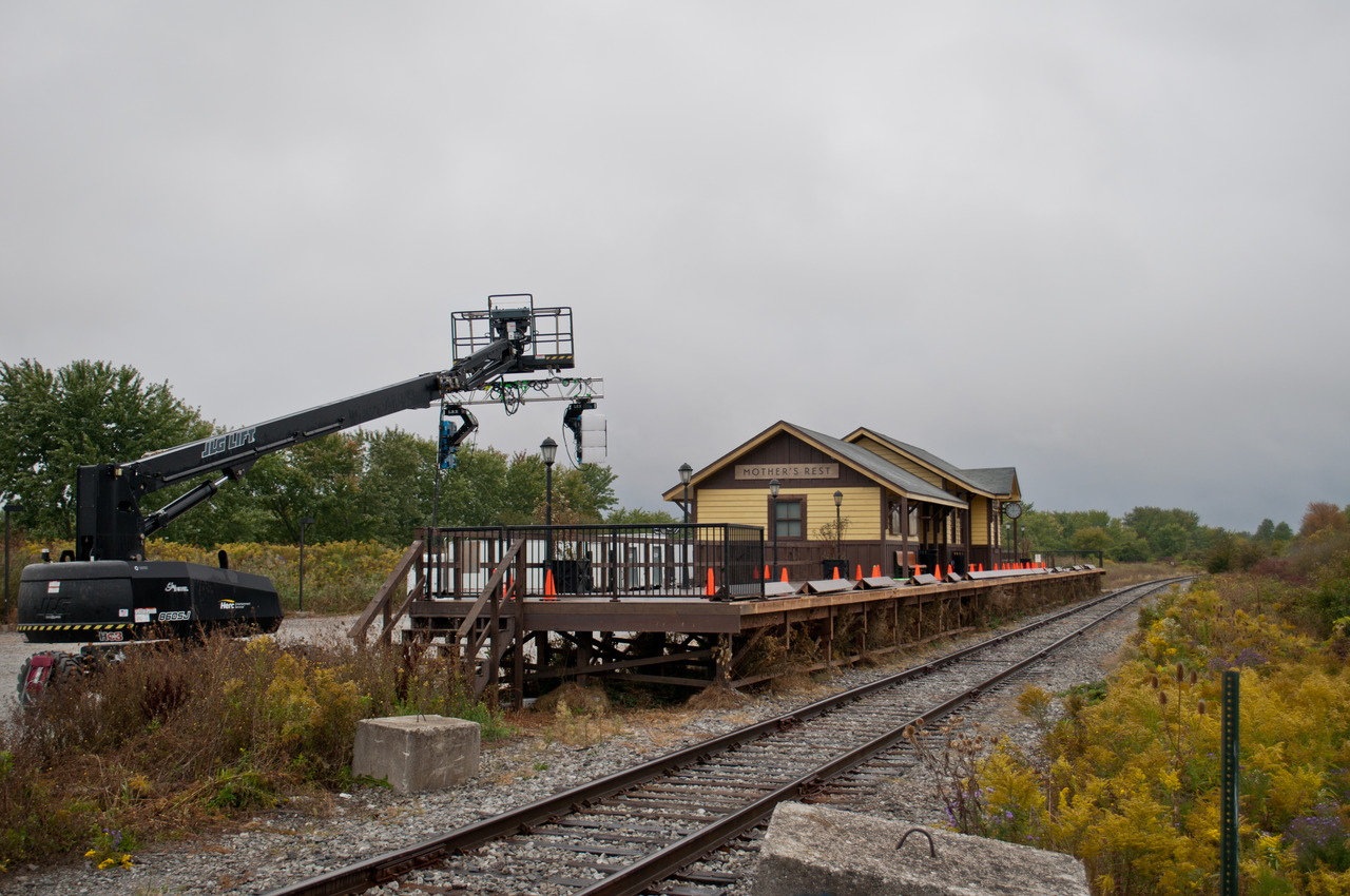 For the fourth time in six years, GIO Rail trackage is used as a film location. The previous being Handmaids Tale in 2020 and 2023, and a Mr Beast challenge in 2024. This time, the former Cayuga Subdivision trackage in Dain City is being used for the Amazon series Reacher. Here we see a station erected for filming a scene at the fictional "Mothers Rest" station. VIA lent a F40 and a few coaches for the train used in said scene. The train was left under scaffolding where GIO generally keeps their power at Feeder, making it difficult to get a photo. After filming, the station was destroyed. One of the GIO guys I talked to suggested using it for an office, but the higher ups must've not shared the same idea.
