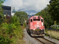 The sun cooperates as CN 500 leaves the Port of Montreal.