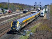 VIA 73 takes the light at Waterdown West departing Aldershot en route to Windsor.  At right, GO 1020 waits to depart for Toronto Union Station, while at left, CN L550 drills the yard with 4725 - 4138.